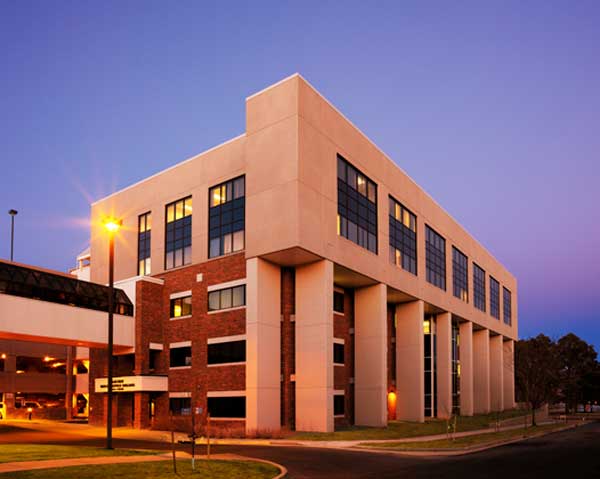 Parkview Hospital building exterior in the evening