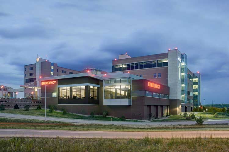 exterior of st. francis emergency department at night